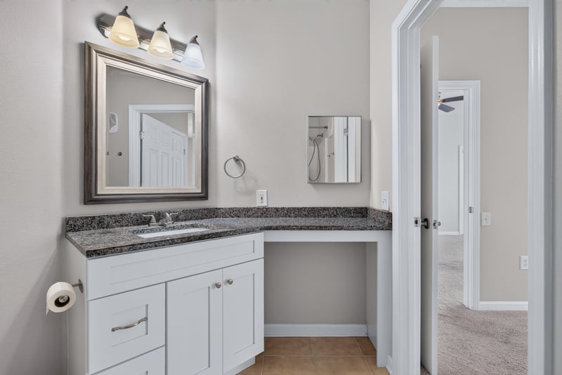 Bathroom vanity with two mirrors at 7990 Baymeadows Rd E #404, Jacksonville, FL 32256