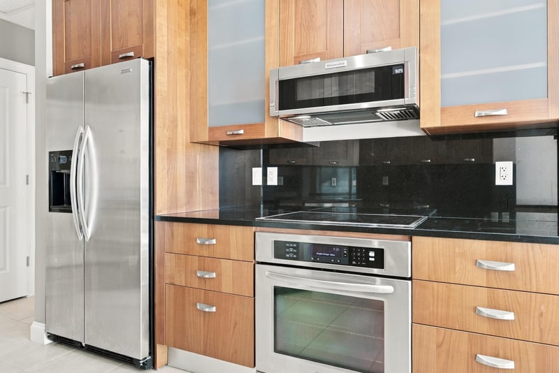 Kitchen refrigerator and cabinetry, photographed by Megapixeler on Riverplace Blvd, Jacksonville