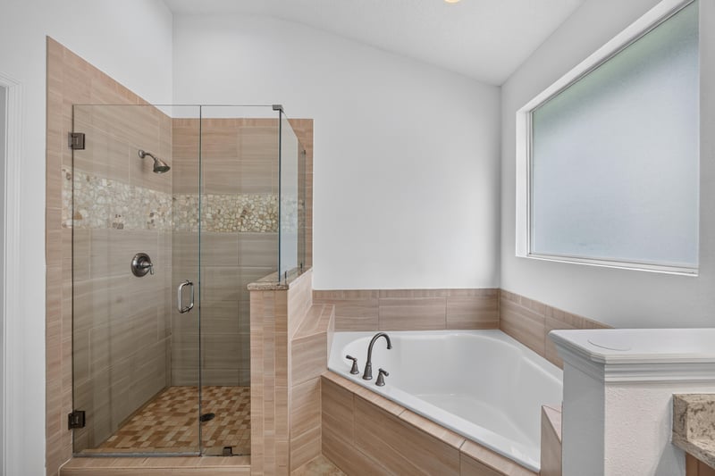Primary bathroom glass walk-in shower at 3101 E Banister Rd, St. Augustine, FL 32092