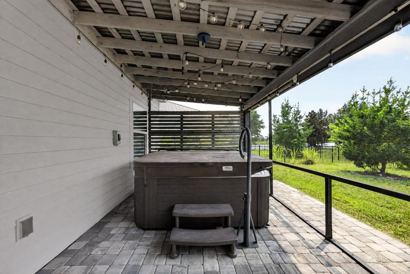 Spa under the covered patio at 91 Tilloo Ct, St. Johns, FL