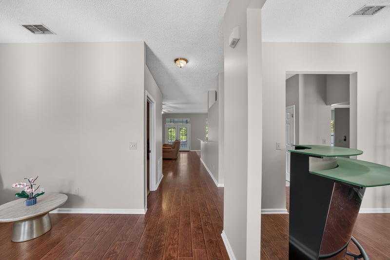 Hallway view toward kitchen pass-through at 11828 Heather Grove Ln, Jacksonville, FL