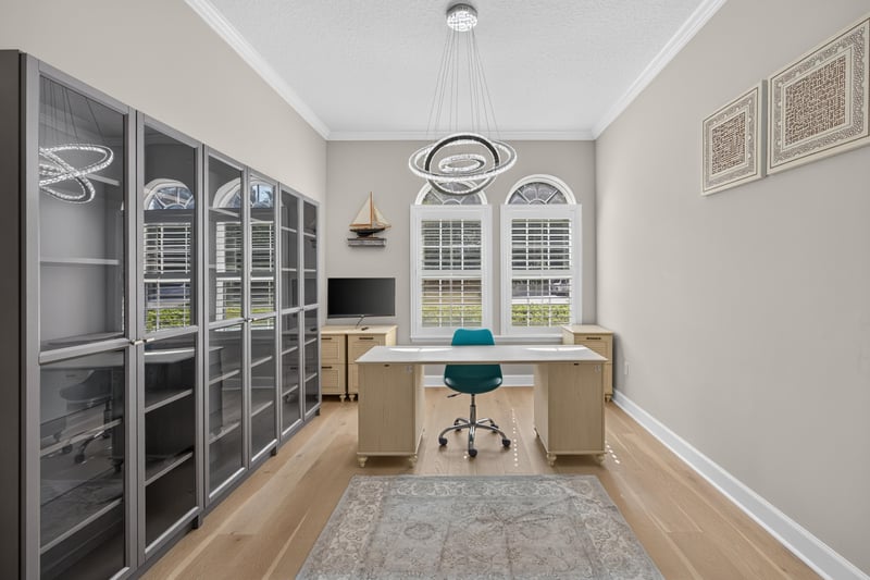 Home office with built-in desk and shelving at 276 Cross Ridge Dr, Ponte Vedra Beach, FL 32081