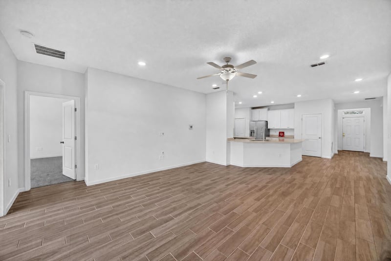 Living room with ceiling fan at 9905 Ansley Lake Dr, Jacksonville, FL