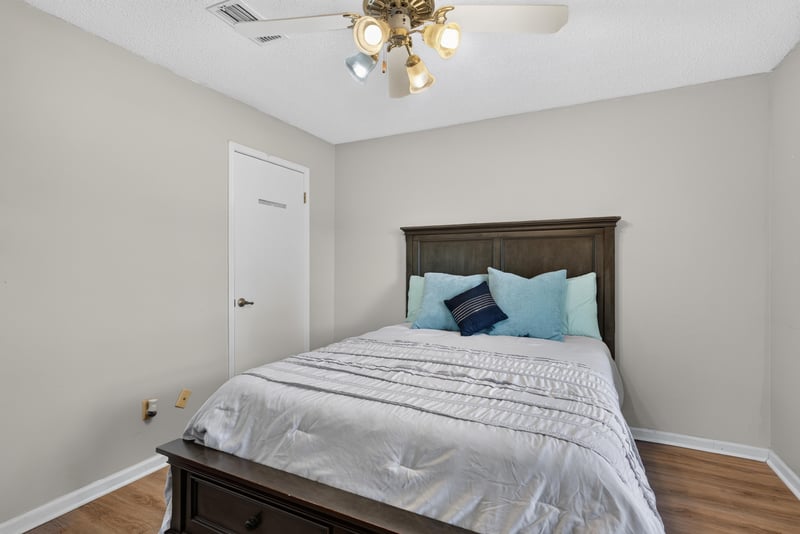 Bedroom with bed near window at 8680 Bandera Cir S, Jacksonville, FL 32244