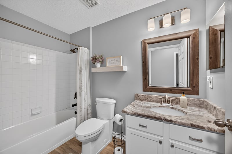 Bathroom with tub-shower combo and vanity at 12825 Kelsey Island Dr, Jacksonville, FL 32224