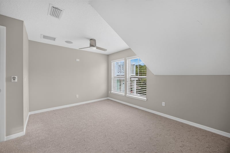 Empty room with vaulted ceiling at 117 Island Cottage Way, St. Augustine, FL 32080