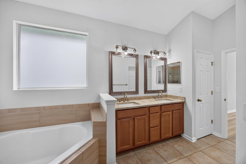 Primary bathroom dual sink vanity at 3101 E Banister Rd, St. Augustine, FL 32092