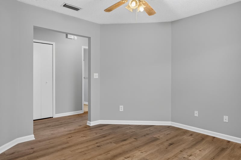 Bedroom with ceiling fan and carpet at 1108 Hidden Cove Cir S, Atlantic Beach, FL 32233