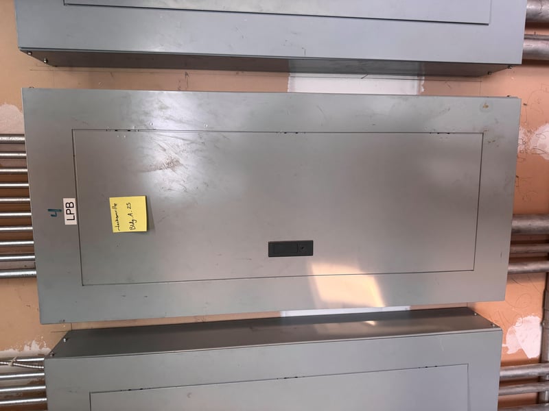 Panel cover with sticky note label at 11700 New Kings Rd, Jacksonville, FL 32219