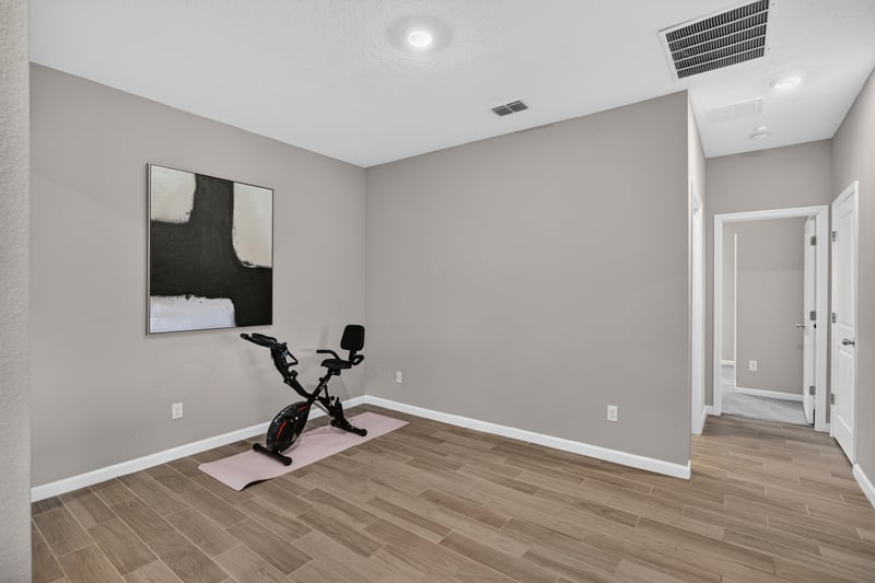Flex room with exercise equipment at 9942 Lovage Ln, Jacksonville, FL 32219