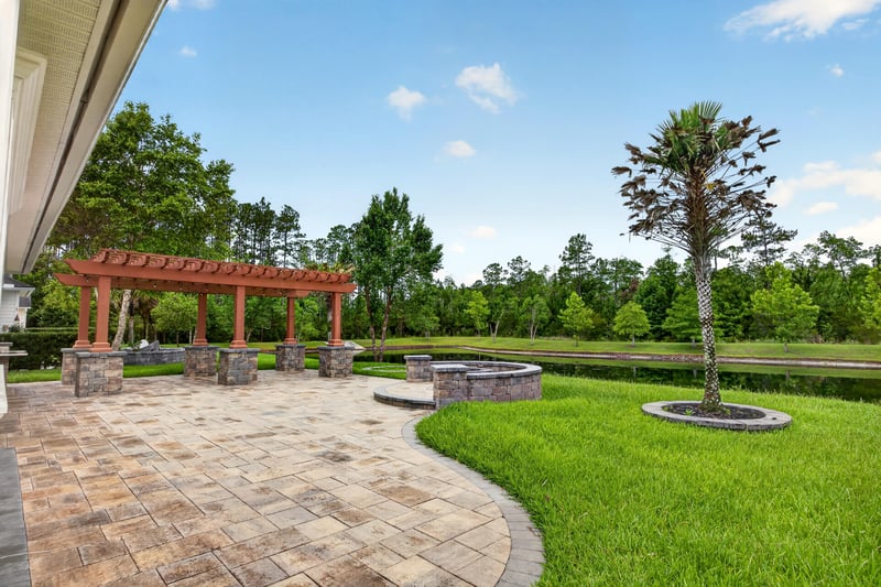 Patio with pergola and fire pit at 186 Freshwater Dr