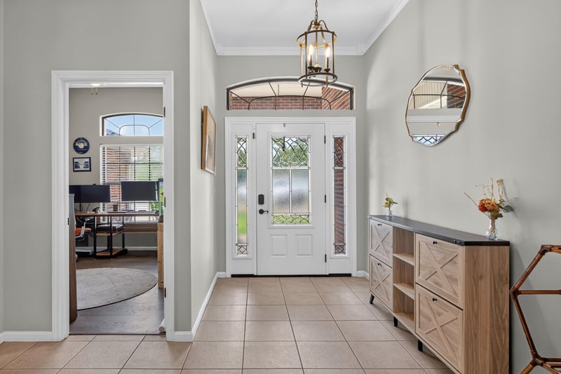 Foyer with front door and sidelights at 2125 Blue Heron Cove Dr, Orange Park, FL 32003