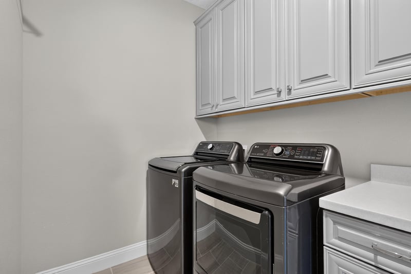 Laundry room with washer and dryer at 22 Azura Point