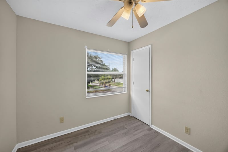 Bedroom with ceiling fan and natural light at 2658 Trollie Ln apt 1, Jacksonville, FL 32211