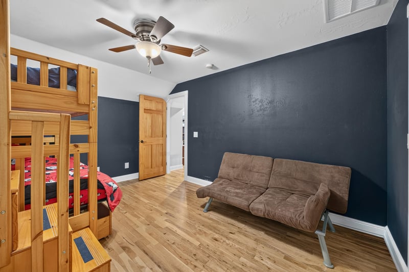 Bedroom with bunk beds and closet doors at 1735 Hagans Ridge Ct