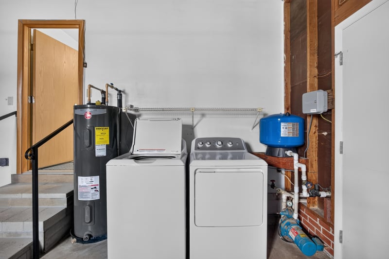 Laundry and utility area with washer, dryer and water heater at 1834 Memory Ln, Jacksonville, FL
