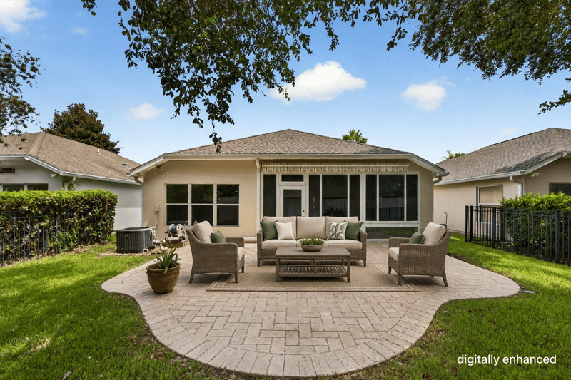 Front courtyard patio with outdoor seating at 11225 Water Spring Cir, Jacksonville, FL 32256