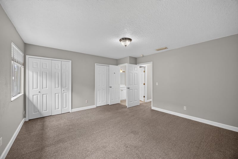Hallway with closet doors at 1800 Park Ave apt 358, Orange Park, FL