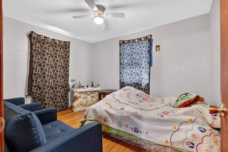 Bedroom with wood floors and bed at 450 E 46th St, Jacksonville, FL 32208