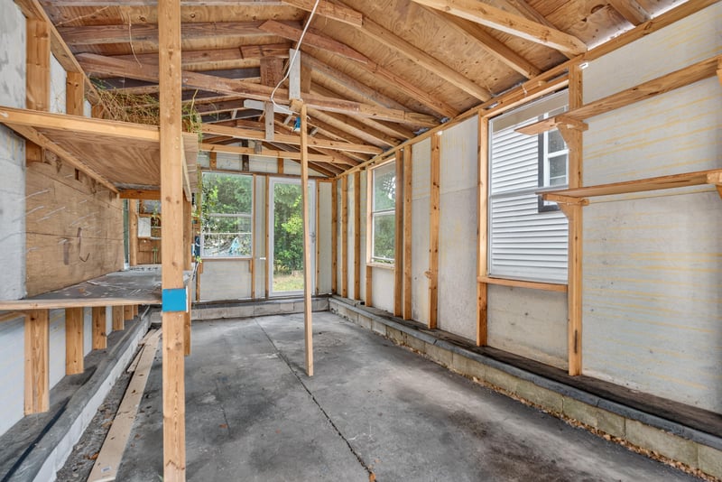 Shed interior with unfinished wood framing at 4565 Appleton Ave, Jacksonville, FL