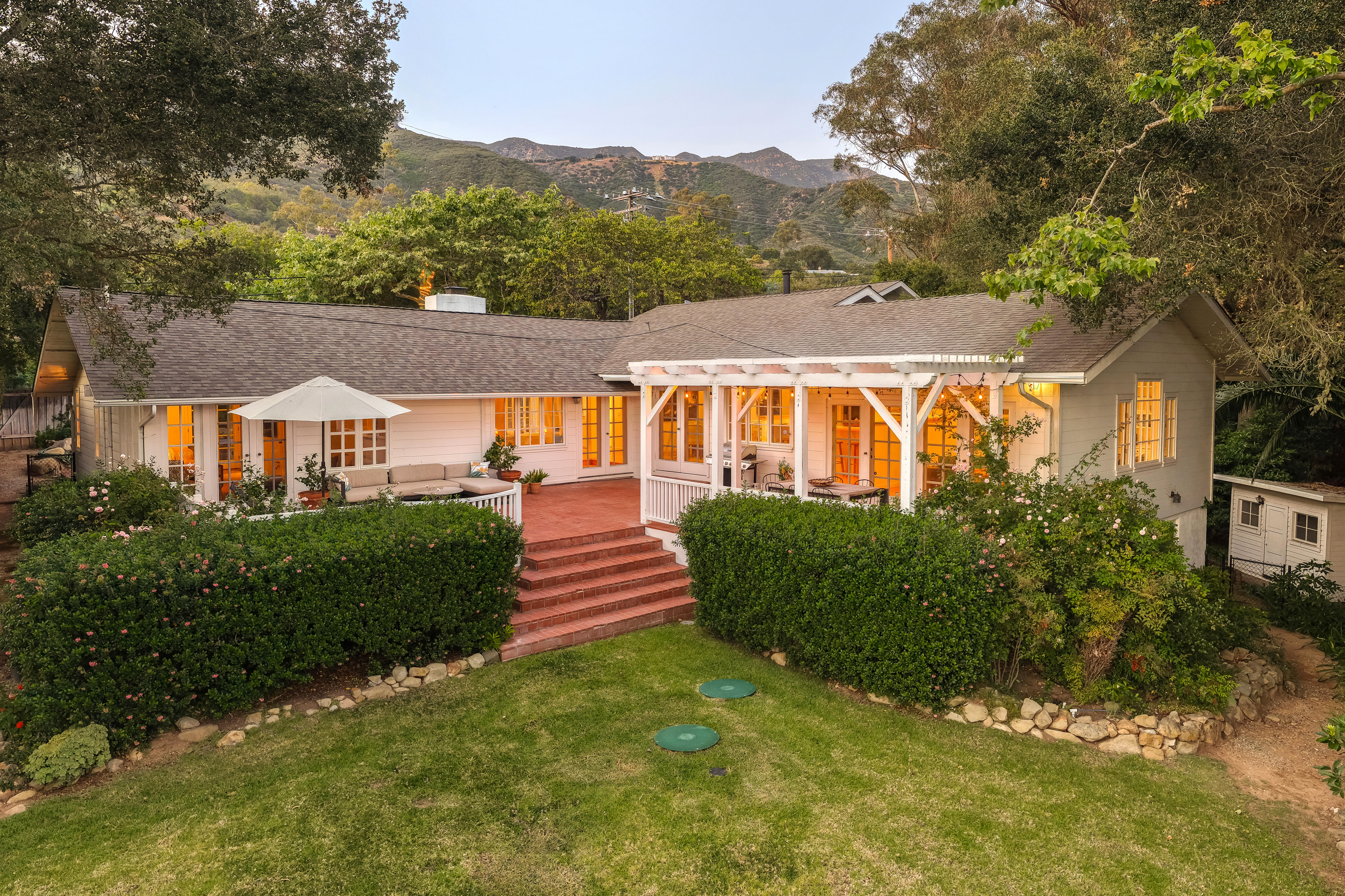 Interior editorial photography of the main living spaces at 2915 Hidden Valley Ln, Santa Barbara — afternoon light pools across architectural details in this virtual real estate photography collection showcasing the American Riviera's most distinguished residential addresses. Our team captured still photography, aerial drone photography, and twilight photography from late afternoon through twilight.