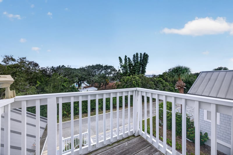 Balcony view with white railing at 117 Island Cottage Way, St. Augustine, FL 32080