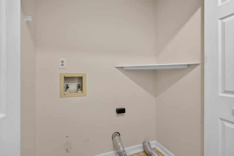 Laundry closet with washer and dryer hookups at 4427 Millstone Ct, Jacksonville, FL