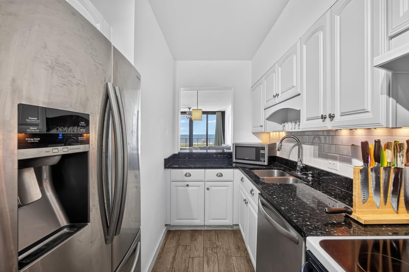 Kitchen with refrigerator and microwave at 601 1st St S, Jacksonville Beach