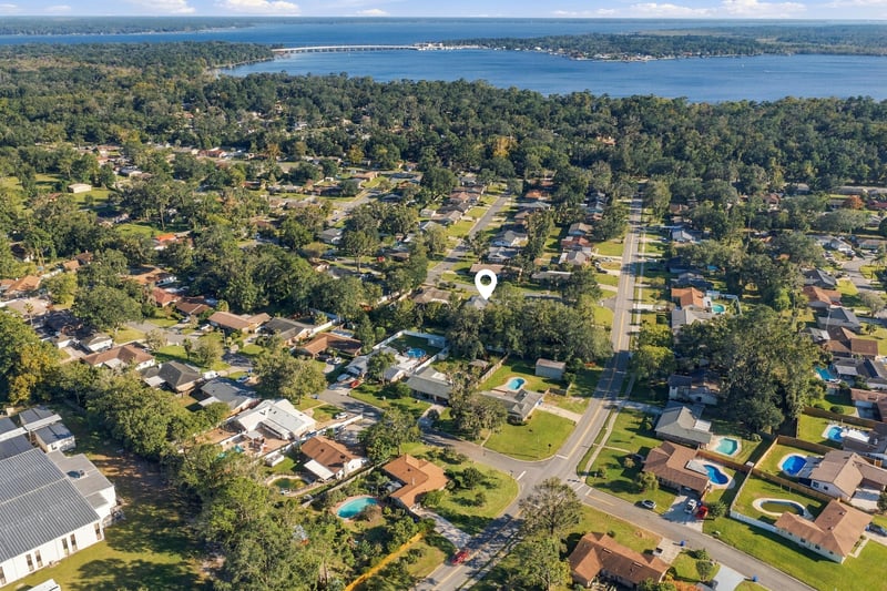 Drone aerial view of the neighborhood and surrounding streets, photographed by Megapixeler on Crosby Ln, Orange Park