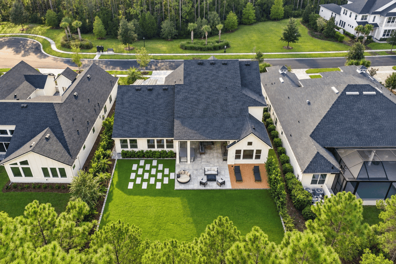 Aerial view of the backyard patio pattern and yard at 907 Seagrove Dr, Ponte Vedra Beach, FL 32081