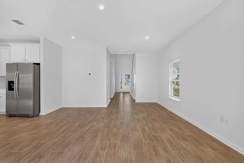 Hallway with view of stainless refrigerator at 269 Bluegrass Wy, St. Augustine, FL 32092