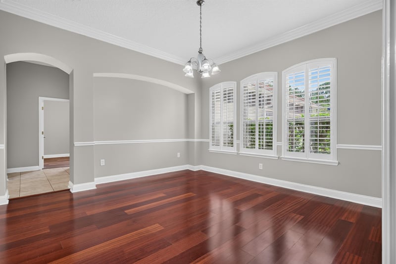 Dining room with tray ceiling and columns at 4109 Eagle Landing Pkwy, Orange Park, FL 32065