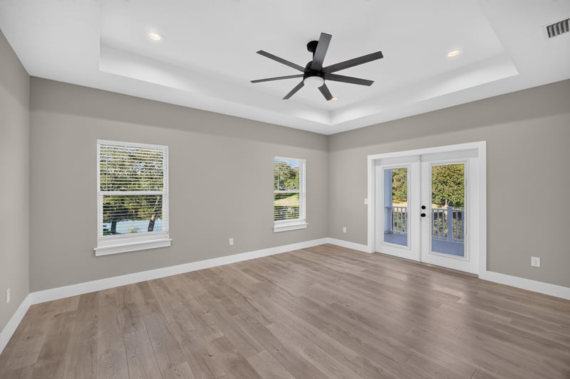 Dining area with tray ceiling and french doors at 175 Alava Ct