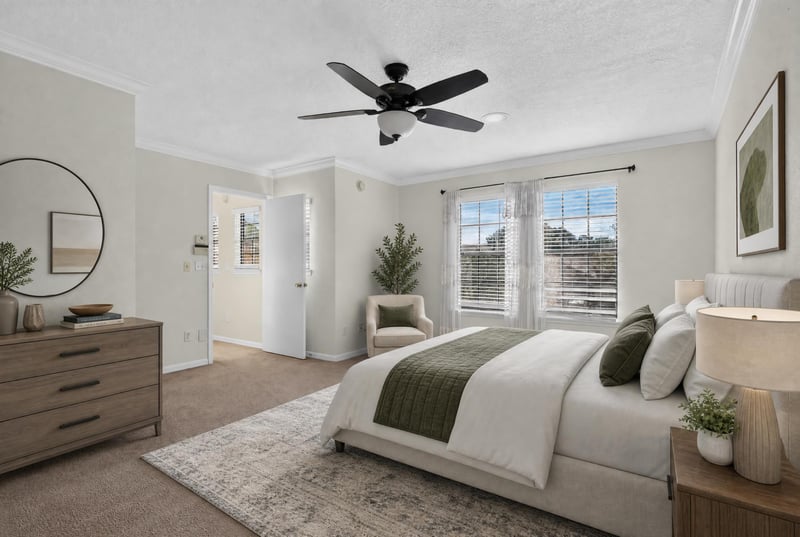 Bedroom virtually staged with bed and dresser at 353 Redwood Ln
