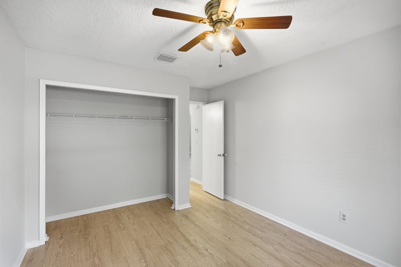Bedroom with closet and window at 678 5th Ave N, Jacksonville Beach, FL 32250