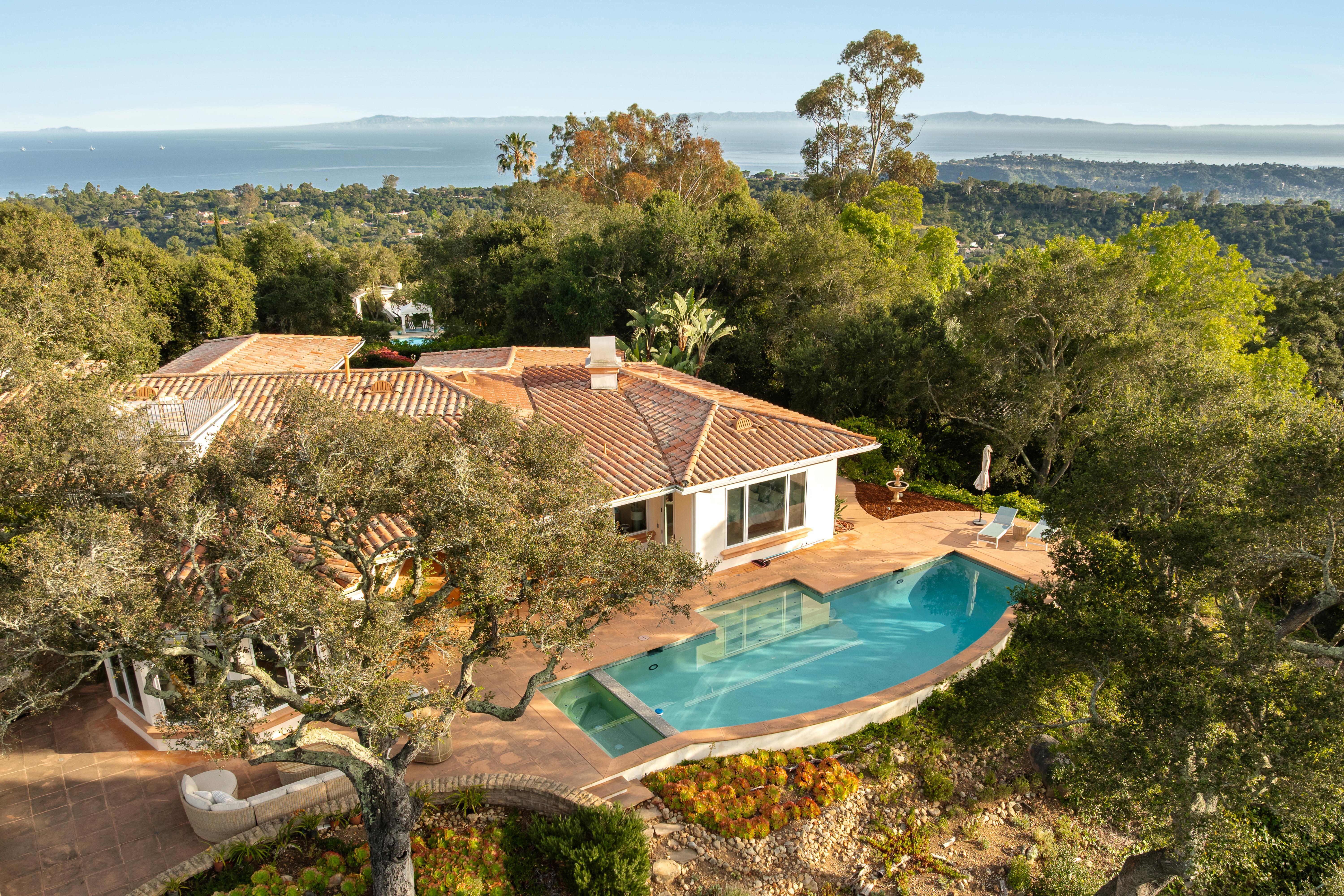 Professional real estate photography of primary suite and ocean-view terrace at 450 El Cielito Rd, Santa Barbara — Matterport virtual tour and still photography package for a distinguished Santa Barbara Riviera estate above Hope Ranch. Our team captured still photography, aerial drone photography, twilight photography, a Matterport virtual tour, a 2D floor plan, and a custom property website from afternoon through twilight.