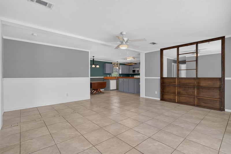 Open living area looking toward kitchen at 2549 Snapdragon Ave, Middleburg, FL 32068