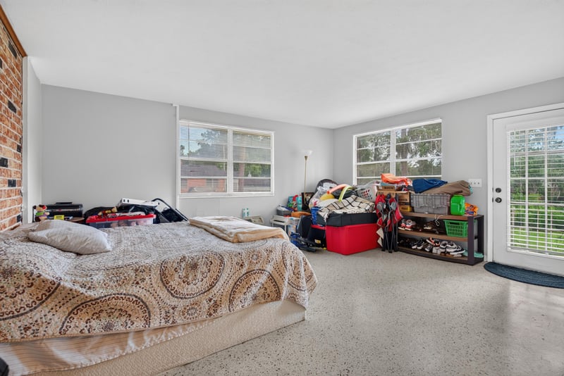 Bedroom with storage and window at 5745 110th St, Jacksonville, FL 32244