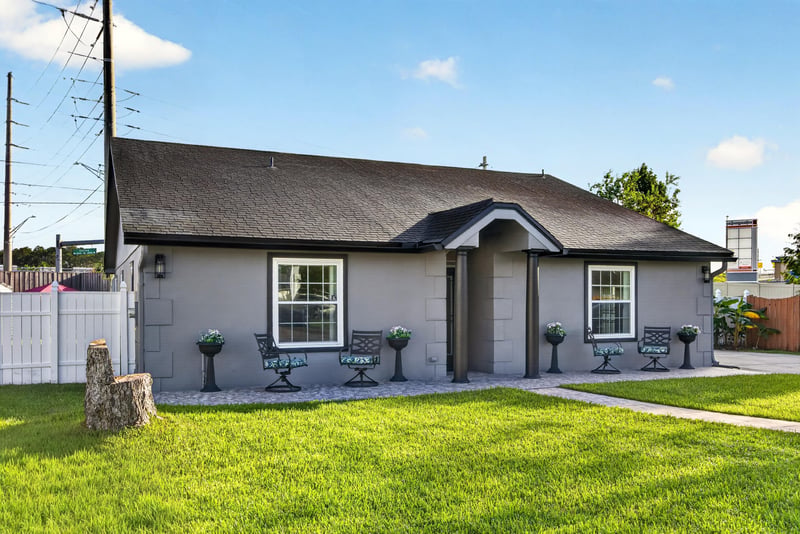Front exterior full view with lawn at 6931 Cane Grass Ln E, Jacksonville, FL 32244