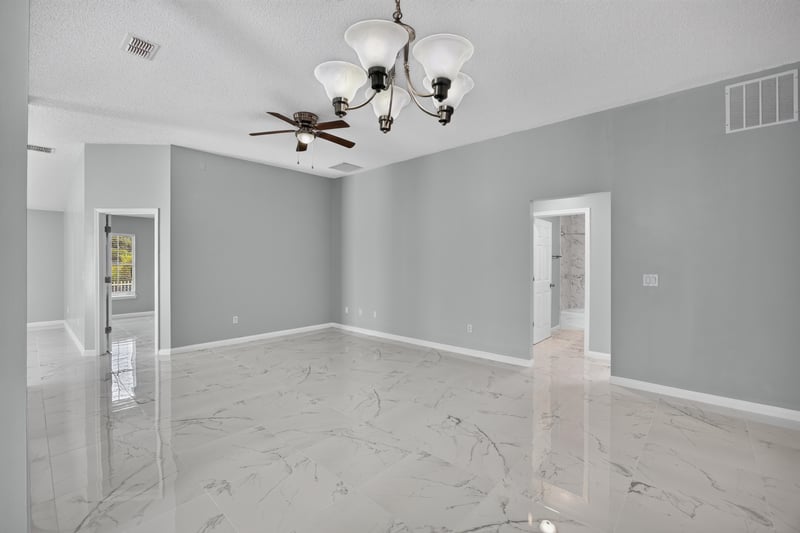 Living area with chandelier and tile flooring at 490 Hillside Dr, Orange Park, FL 32073