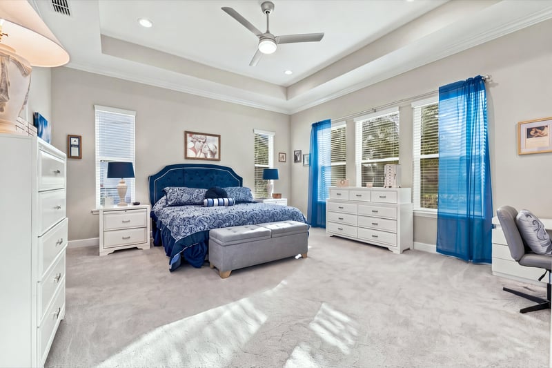 Primary bedroom with natural light, photographed by Megapixeler on Lucena Ln, Jacksonville, FL