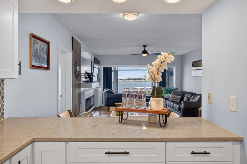 Kitchen peninsula open to living room at 2280 Shepard St