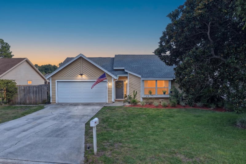 Front exterior at day-to-dusk light at 13020 Medford Ln, Jacksonville, FL 32225