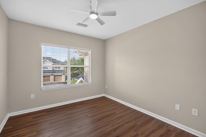 Bedroom with window at 3750 Silver Bluff Blvd, Orange Park, FL