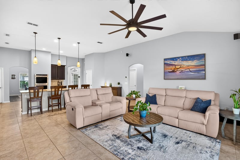Open living room, kitchen, and dining area at 538 Porta Rosa Circle, St. Augustine, FL 32092