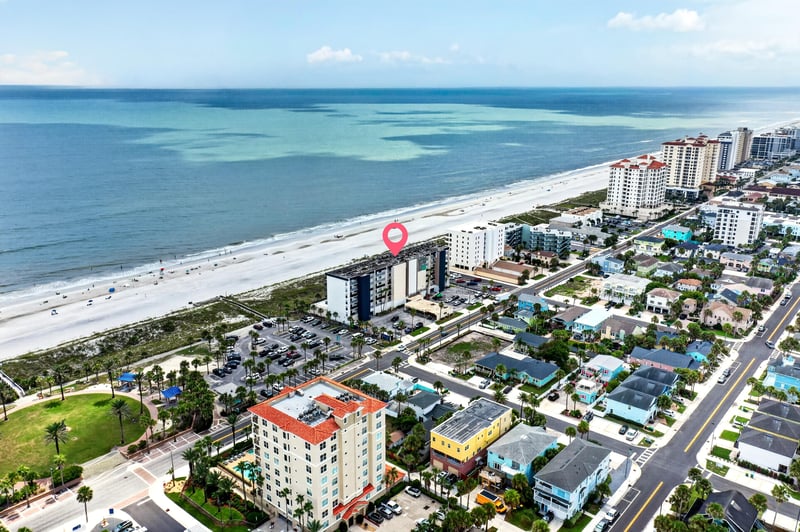 Aerial view of the beach and nearby buildings in Jacksonville Beach