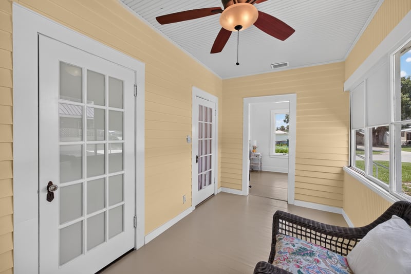 Sunroom with French doors at 101 N Lake St, Crescent City, FL