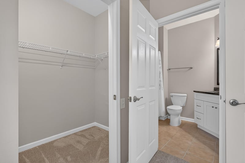 Walk-in closet with shelving at 7990 Baymeadows Rd E #404, Jacksonville, FL 32256