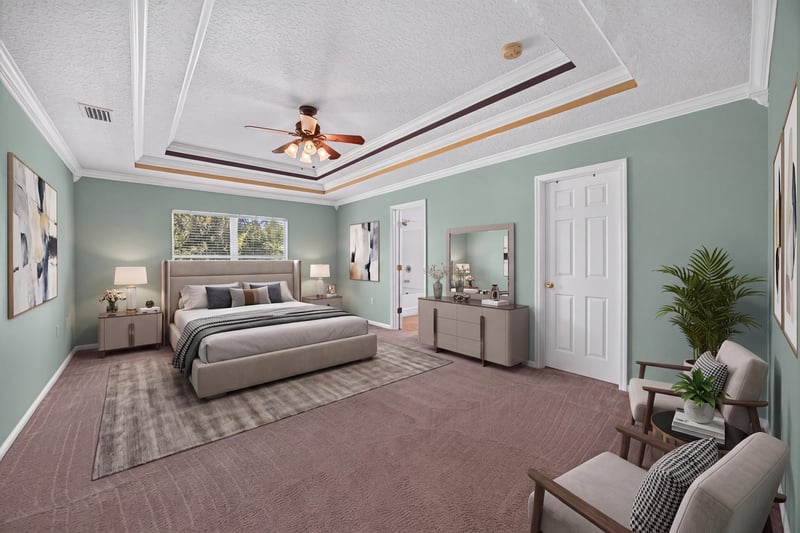 Virtually staged primary bedroom with tray ceiling at 2282 Justin Lake Dr, Jacksonville, FL