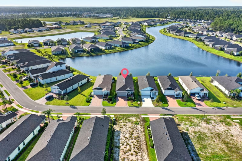 Aerial view of the street along the pond in St. Augustine, FL